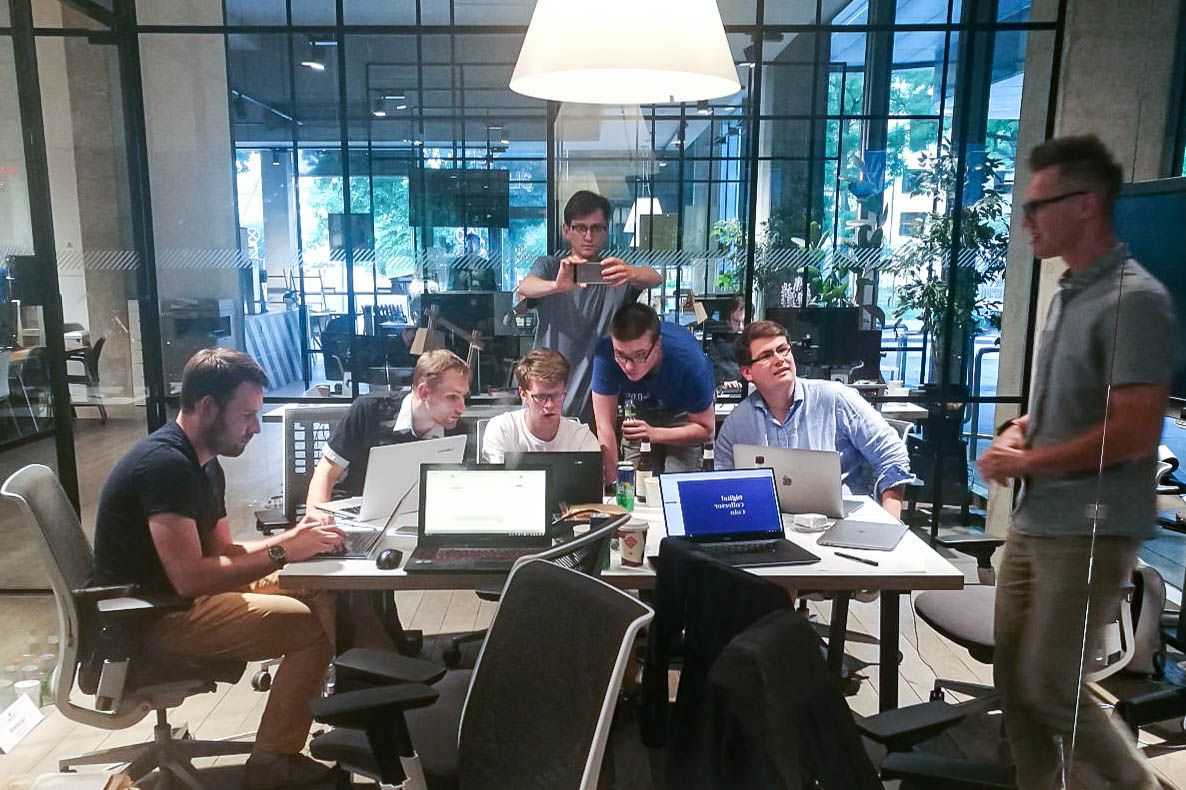 SpectroCoin team working on the Digital Collector Coin project.